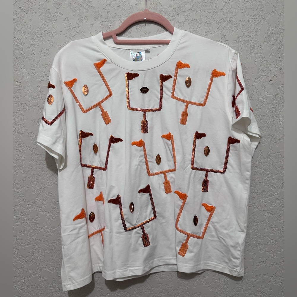 White and Orange Queen of Sparkles/QOS football field goal tee